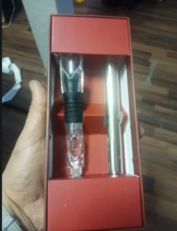 Wine pourer with vhill rod